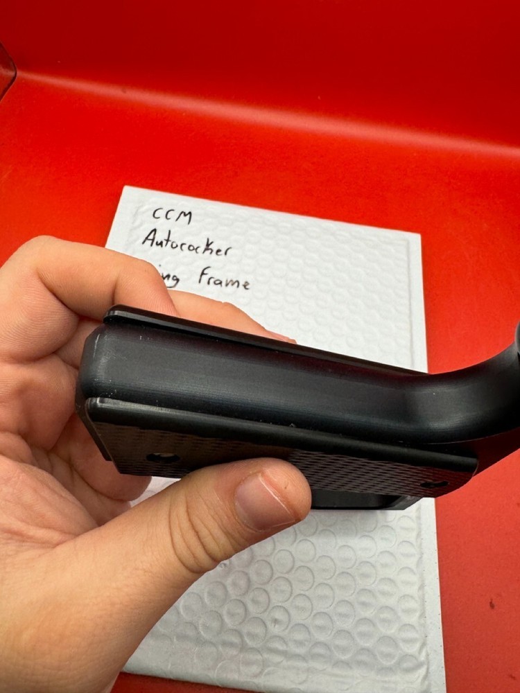 CCM Autococker Swing Frame Black