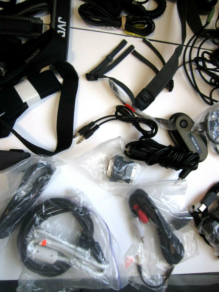 Lot of electronics, Assorted camera straps , Assorted cables and more ZZ