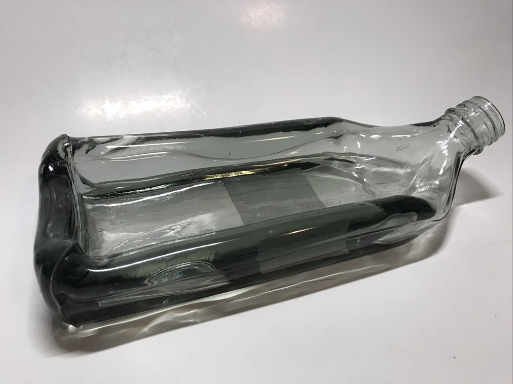 Unique Melted slumped relaxed bottle tray cheese log server bread dip