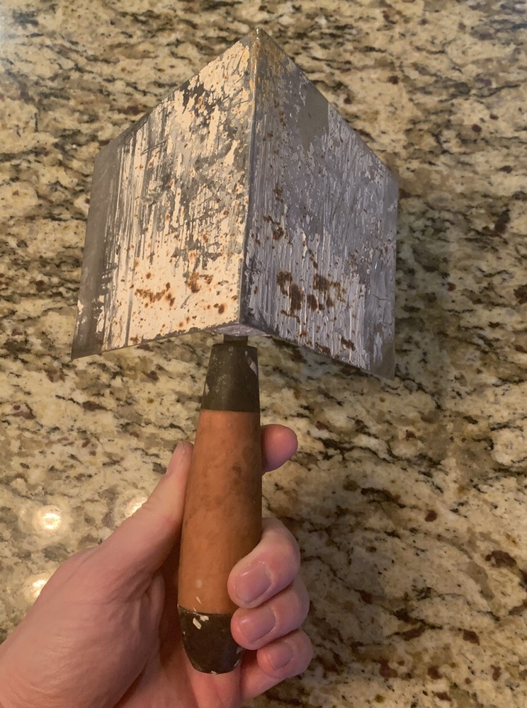 inside corner trowel 5” x 4” with wood handle