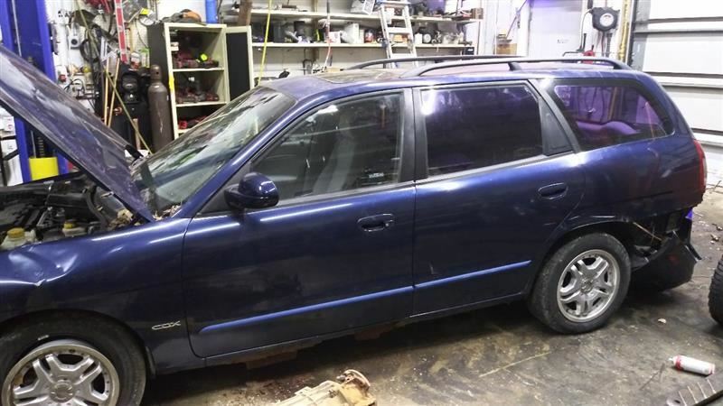 2000 Daewoo Nubira Passenger Side Cargo Storage Box