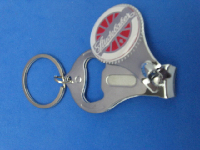 STUDEBAKER WAGON WHEEL KEY RING NAIL CLIPPER BOTTLE OPENER #282