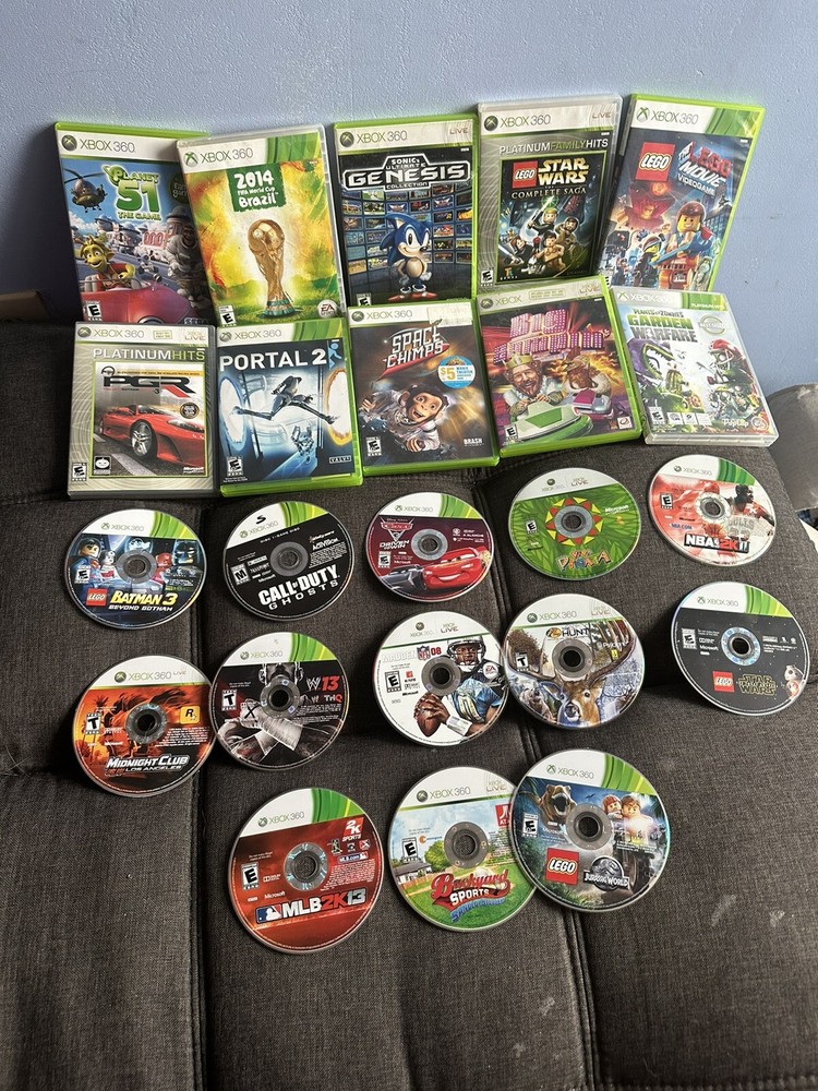 xbox 360 console with controller and games