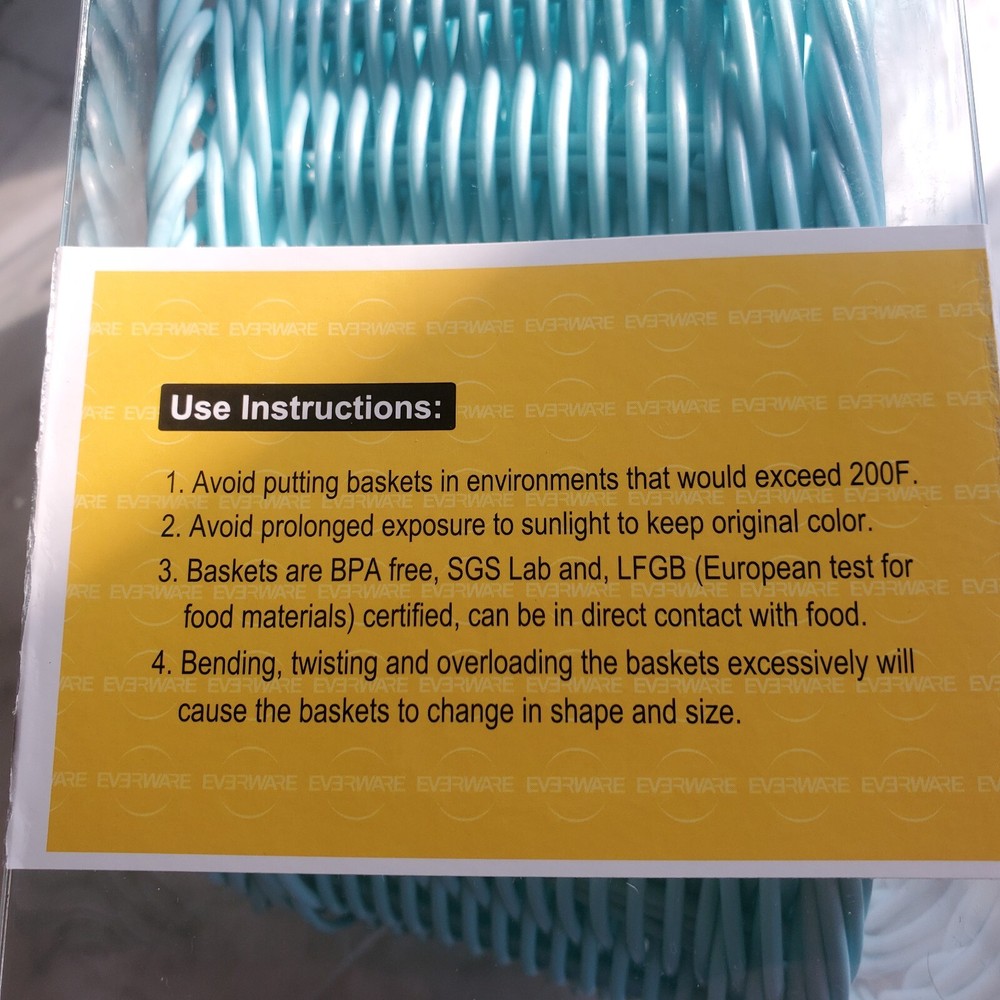 3 woven plastic baskets. sky blue