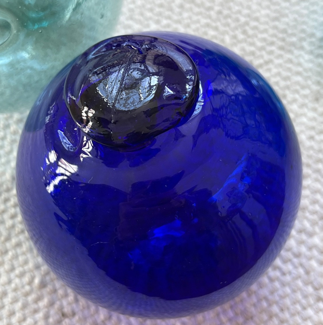 Lot of 7 vintage hand blown glass fishing floats or balls.