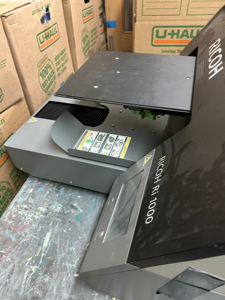 Ricoh RI-1000 DTG printer.