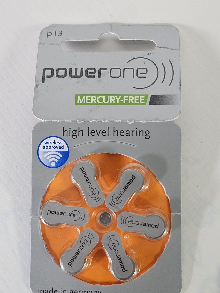 Unitron Quantum 2s behind -the-ear hearing aides (left & 2right) with batteries