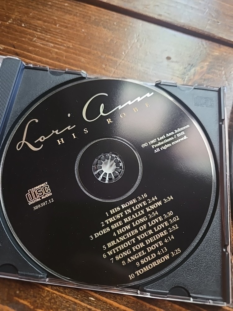 Lori Ann Johnson His robe Autographed Cd
