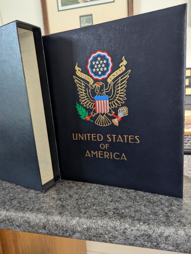 US - DAVO LUXE - GENTLY USED - US - VOLUME I + II + III HINGELESS STAMP ALBUMS