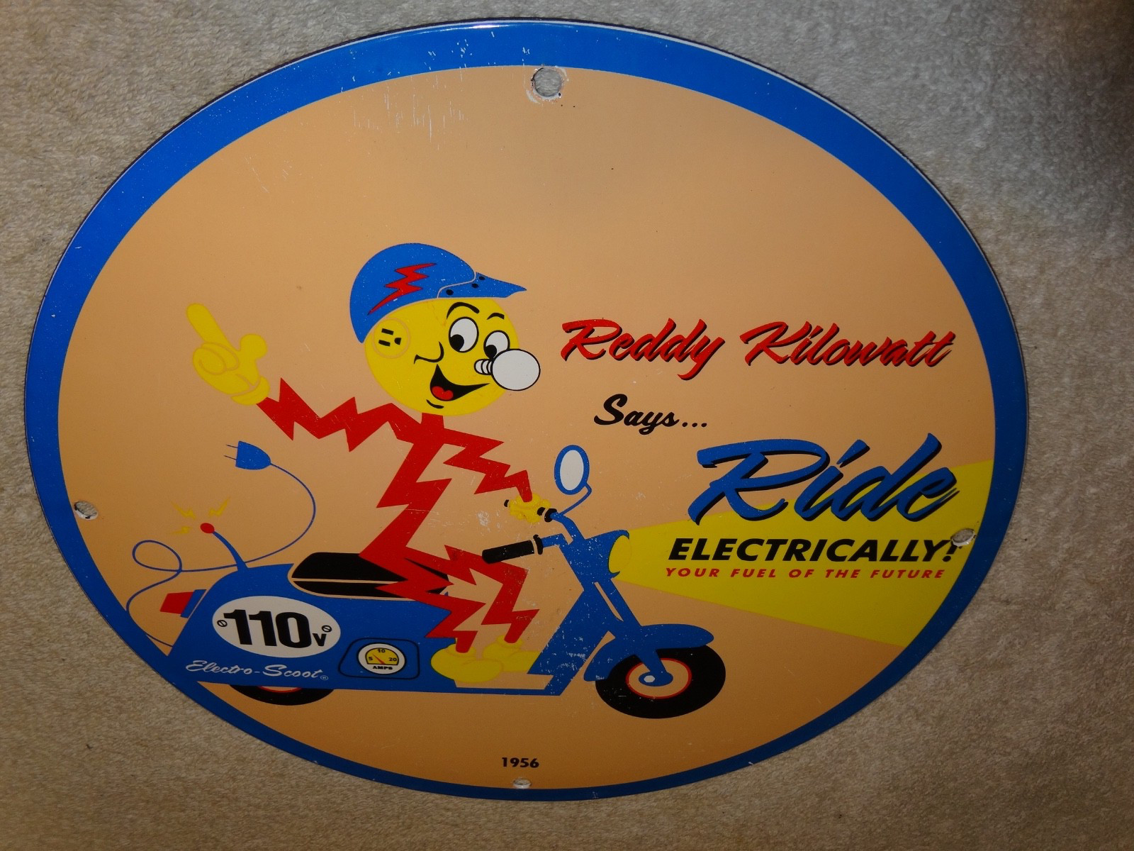 VINTAGE 56 REDDY KILOWATT ELECTRIC SCOOTER 11 3/4" PORCELAIN METAL GASOLINE SIGN