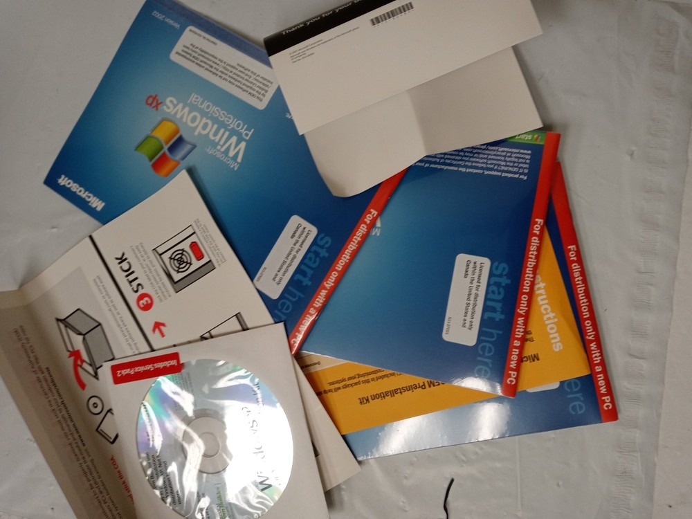 Boxed Microsoft Windows XP Professional w/SP2c Operating System (E85-05103) 3pak