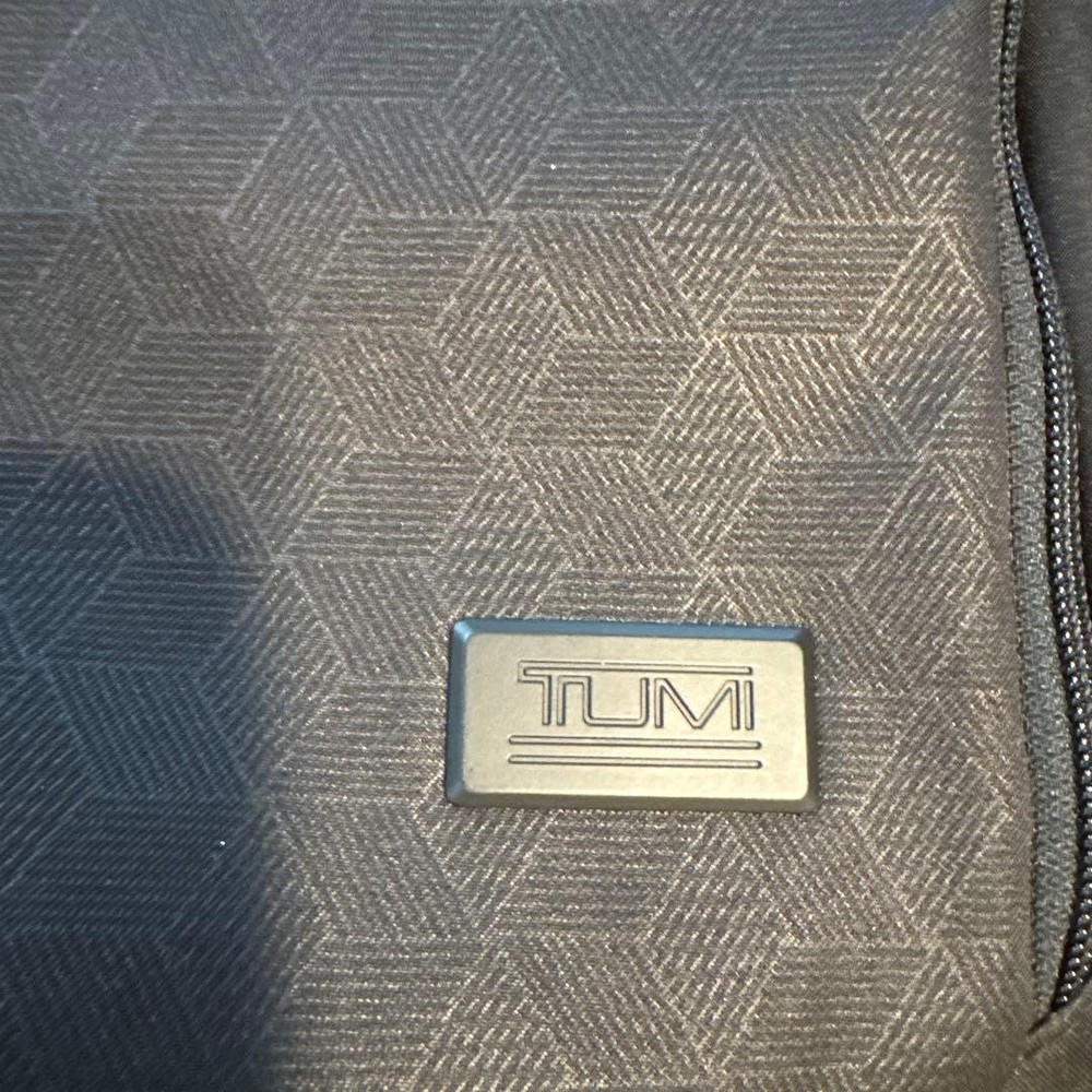 TUMI geometric pattern black backpack