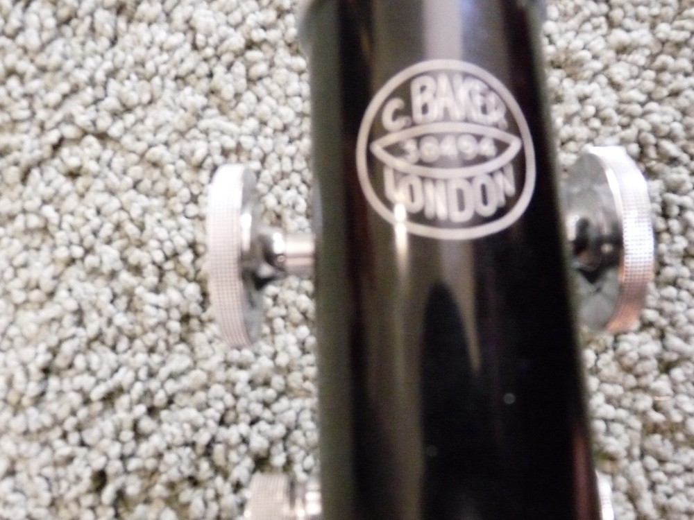 BAKER MICROSCOPE W CASE AND LENSES 4- 879