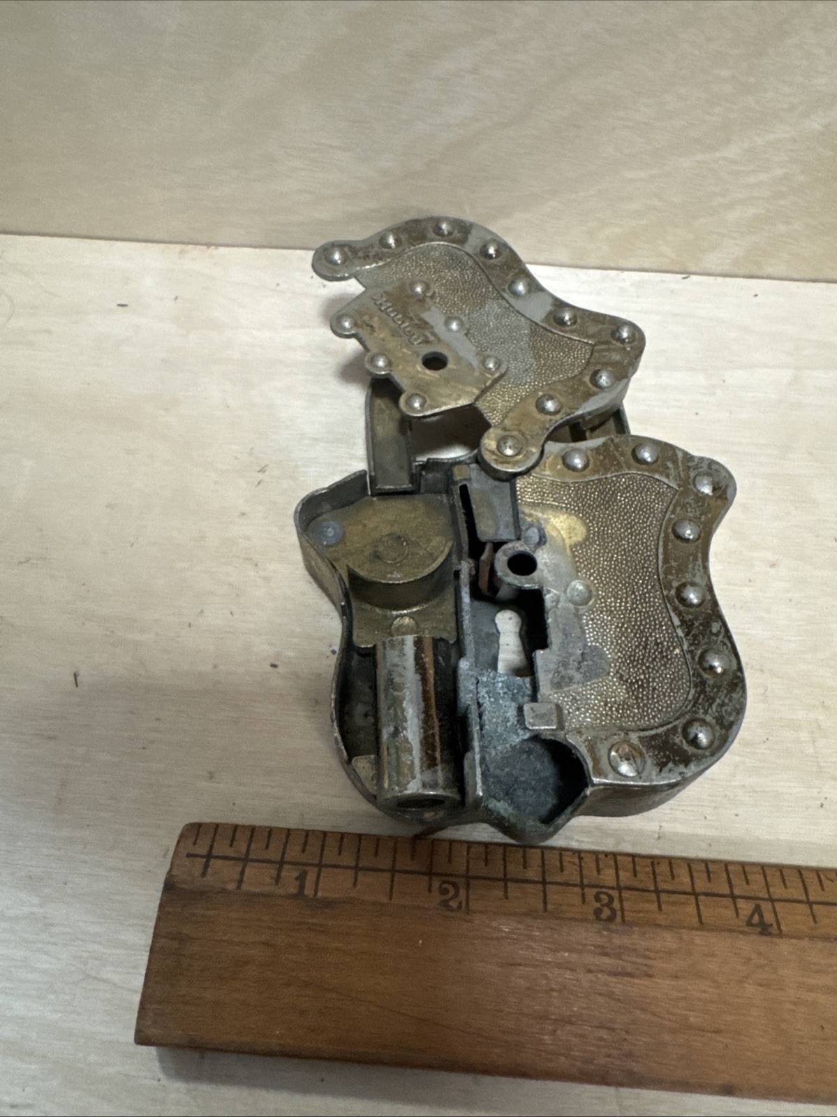 vintage Hubley Padlock Cap, a unique toy from the mid-20th century