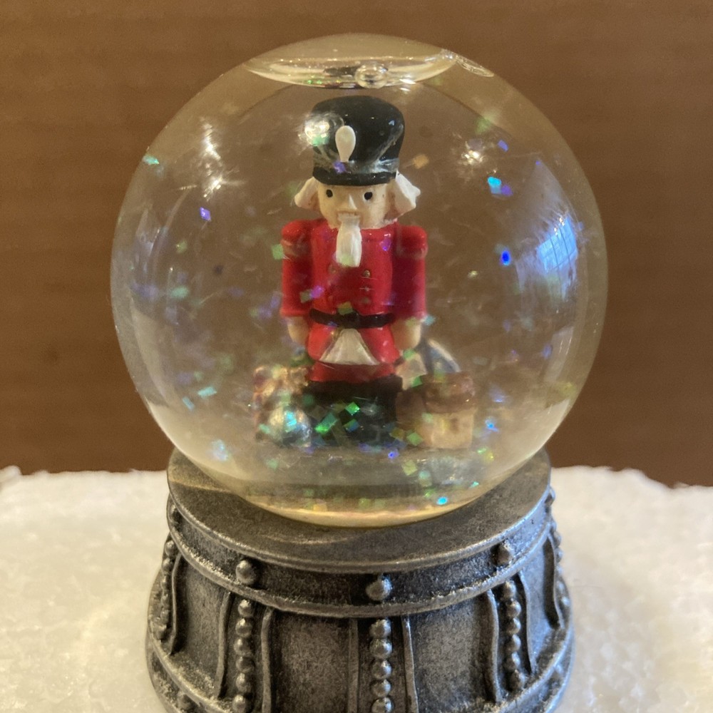 Mini Nutcracker Snow Globe With Metal Base Height 2.5 inches