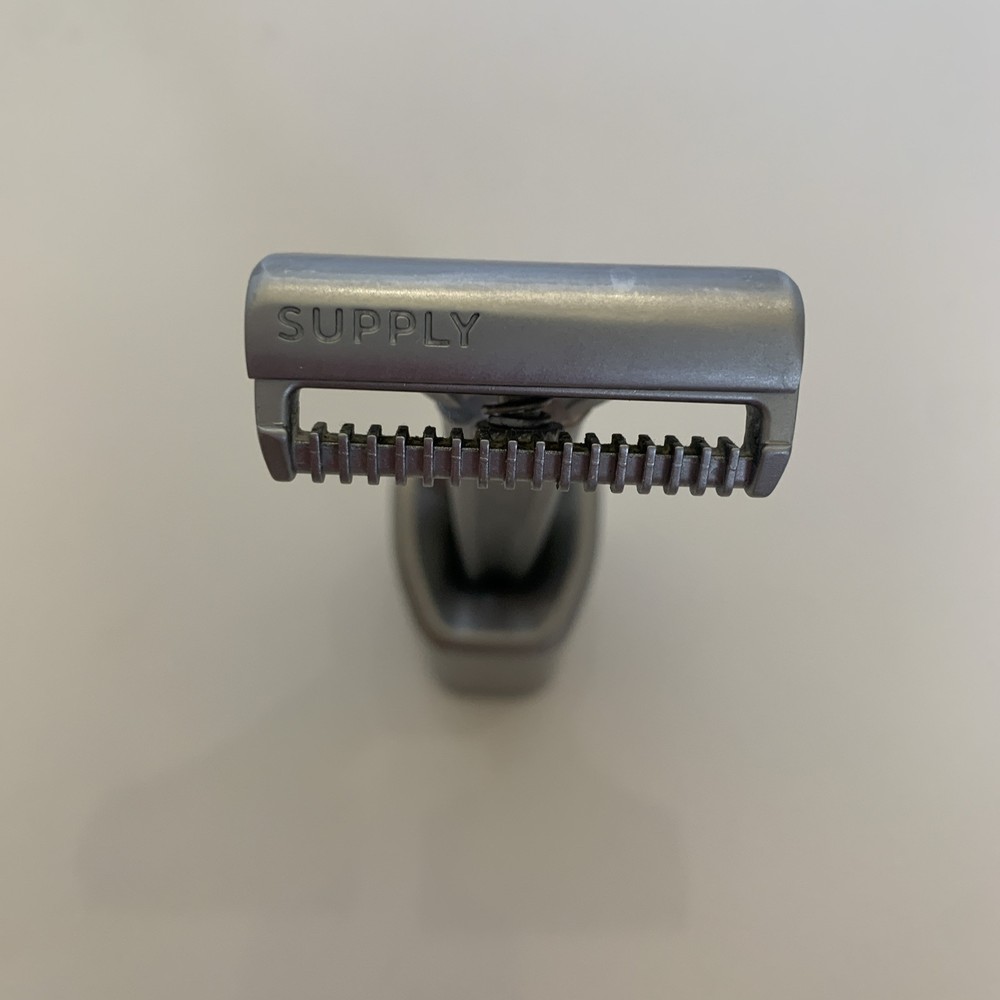 Supply Co Razor And Stand Used