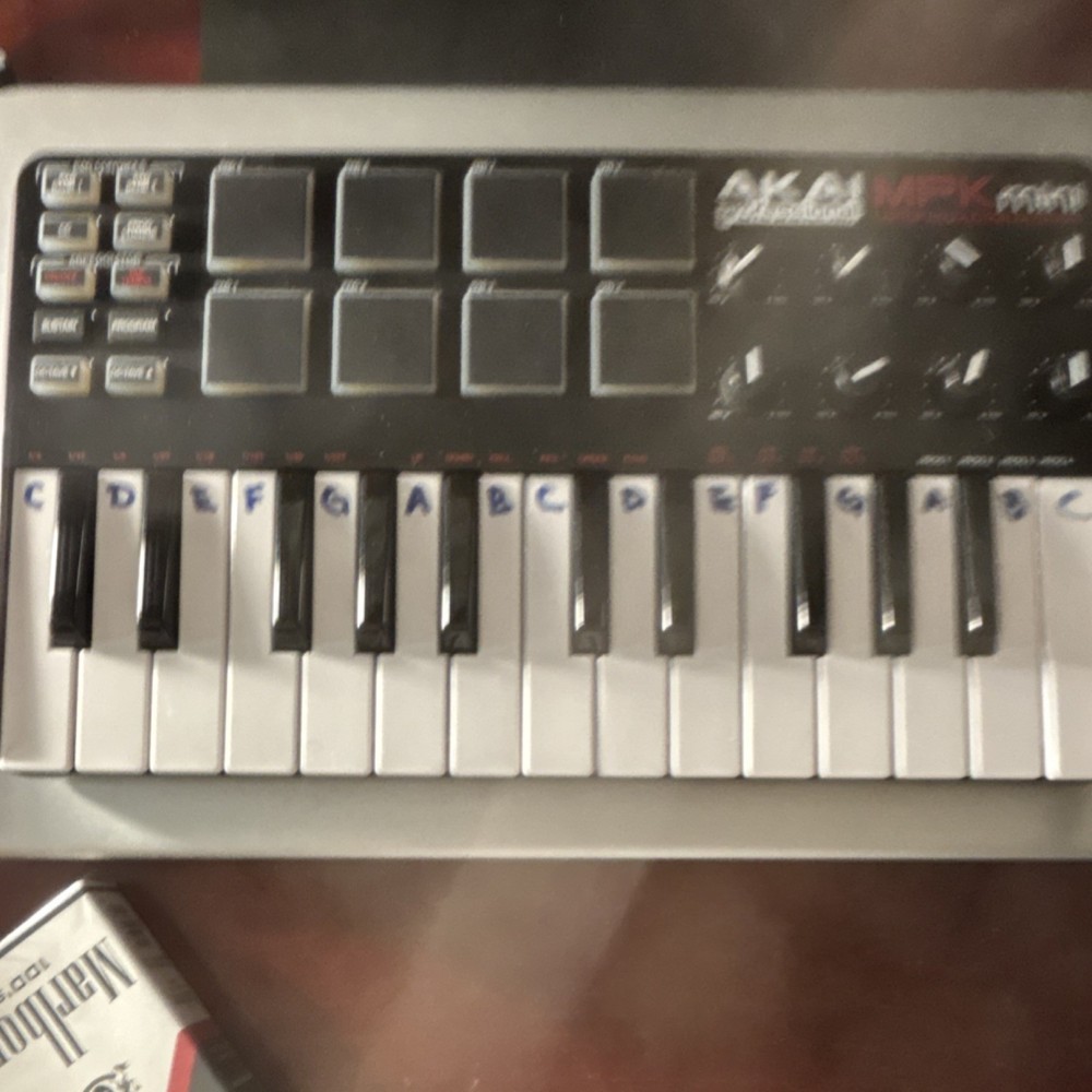 Akai MPK mini 25-Key Synth MIDI Keyboard Controller w/ Pad Triggers, USB Out