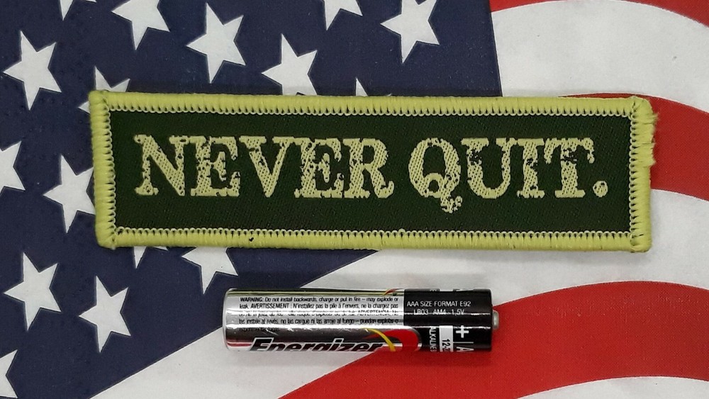 Never Quit - Morale Patch Subdued Green Hook & Loop Application 3"x 1"