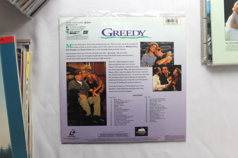 GREEDY laserdisc LD LETTERBOX EXTENDED PLAY MICHAEL J. FOX *QUICK SHIP*