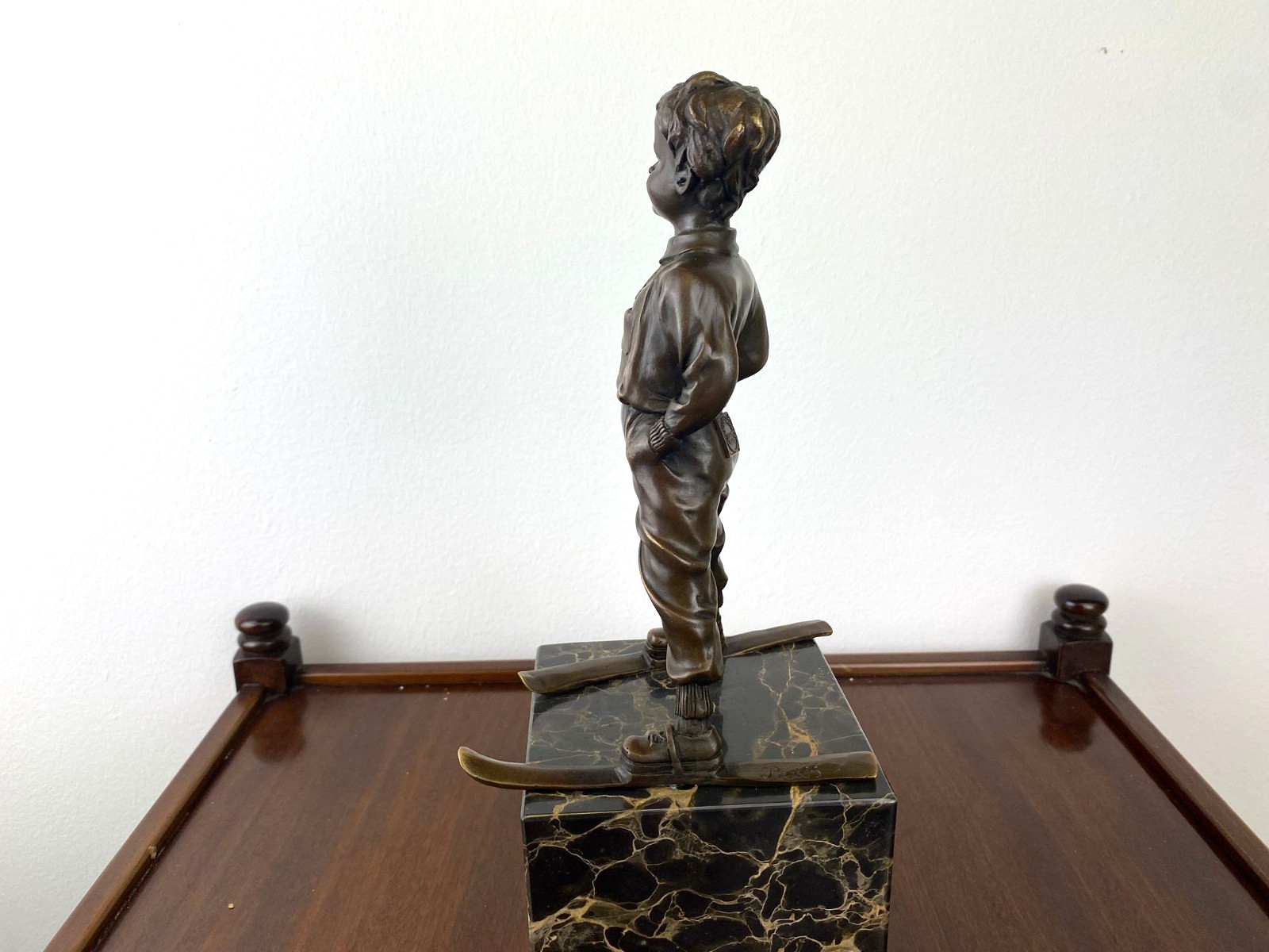 Bronze sculpture boy with ski on marble base after Ferdinand Preiss