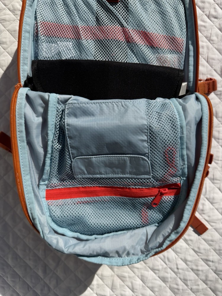 Hydro Flask Down Shift Hiking Backpack 14 Liter Hydration Day Pack Bronze Orange