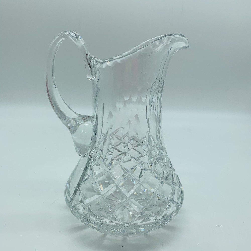 Lead Crystal Pitcher, Cut crystal pattern with Starburst Pattern 9”