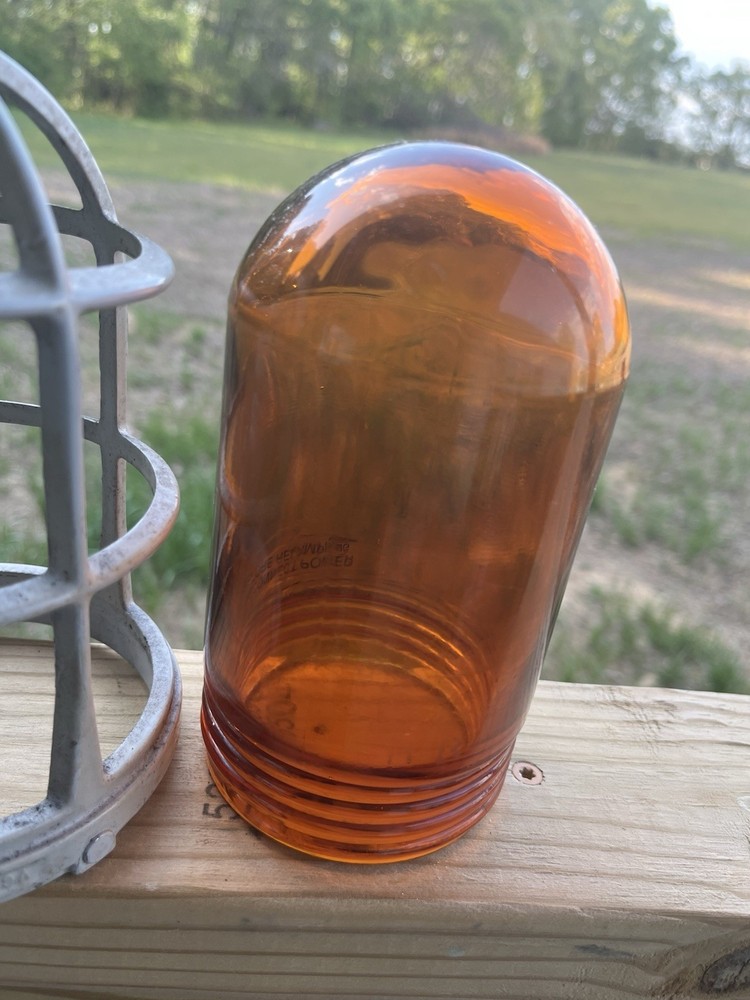 APPLETON FORM 100 EXPLOSION PROOF LIGHT W/ CAGE And GLOBE AMBER COLOR. Untested