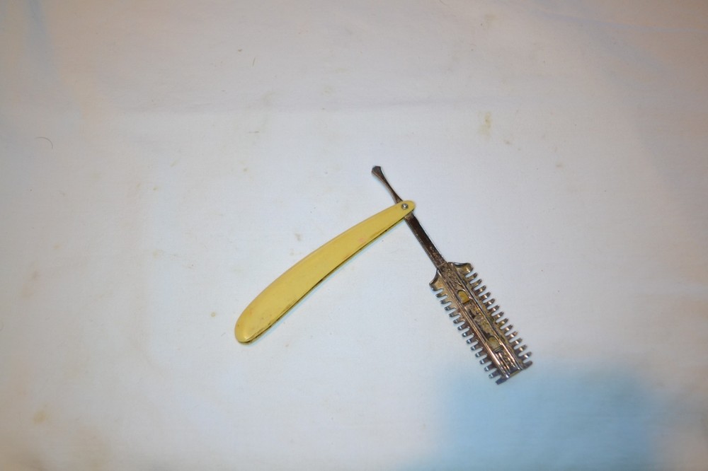 STRAIGHT RAZOR DURHAM DUPLEX WITH CELLULOID HANDLE