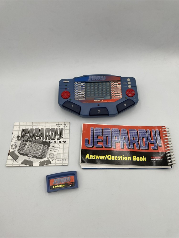 Tiger Electronics Jeopardy Hand Held Game 1995 with Answer Book & Manual E1