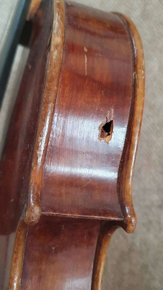 old Violin 4/4 with a nicely flamed back , needs repair