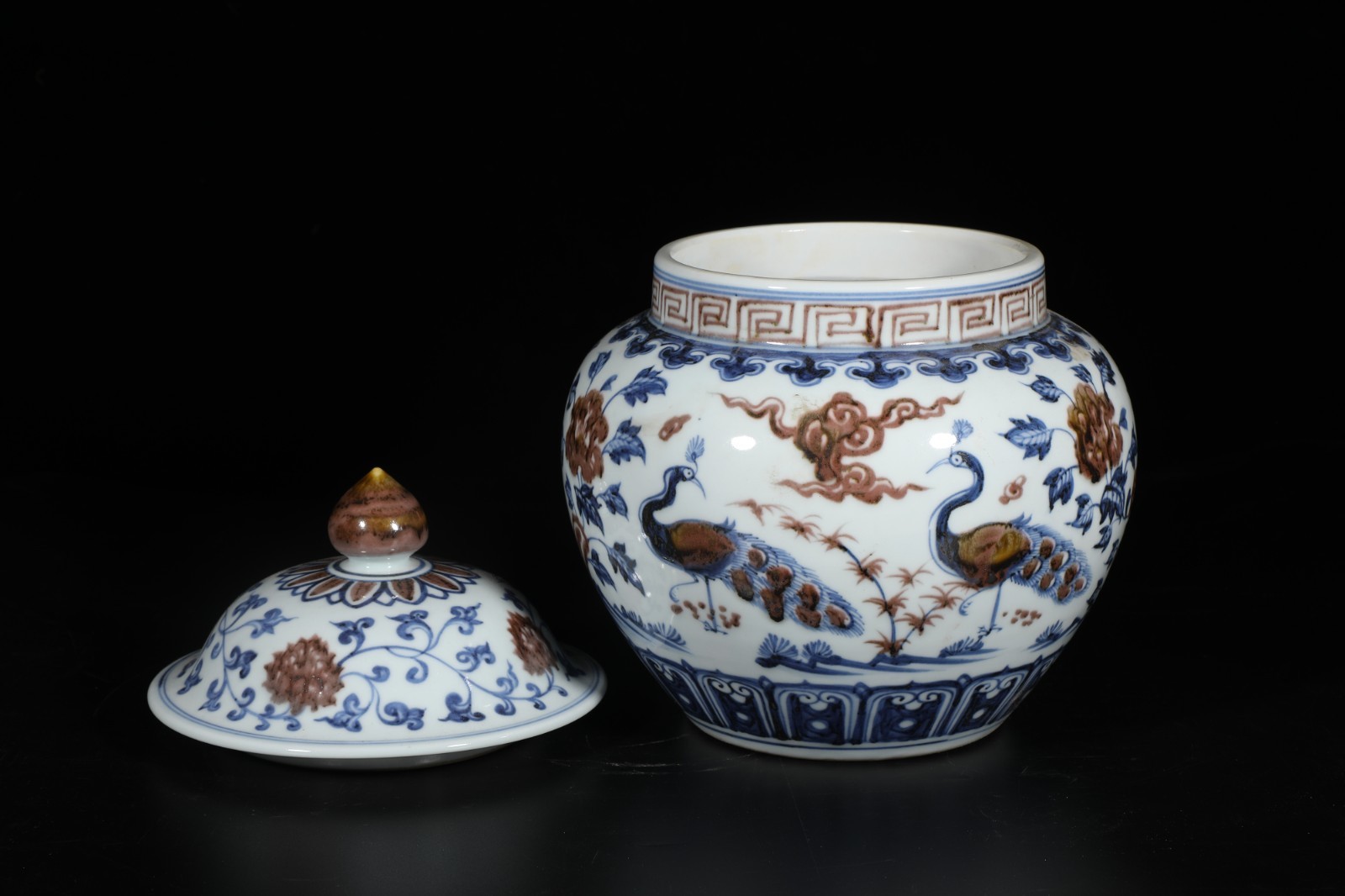 An Iron Red Blue & White Porcelain Jar with lid. 'xuanDe' mark