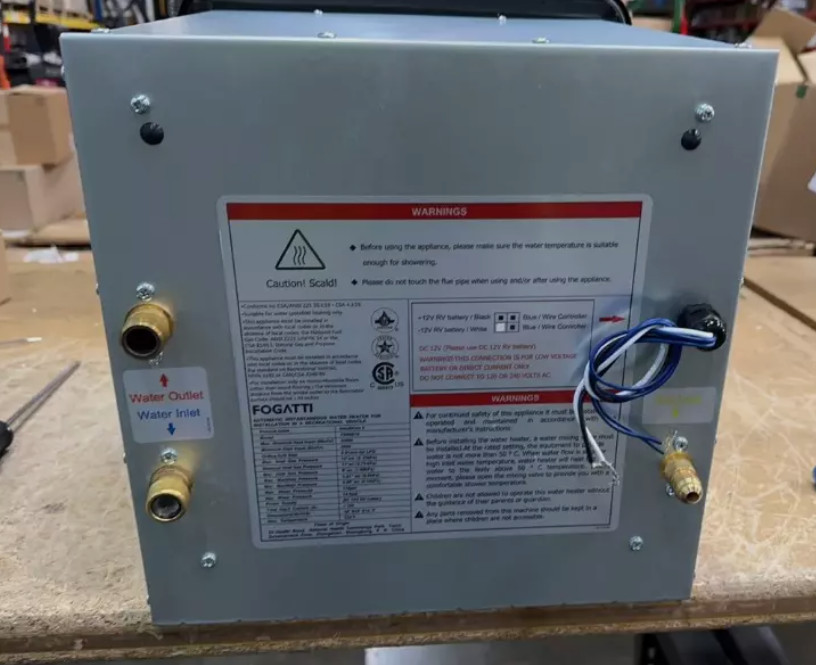 Used 2.5GPM RV Tankless Water Heater 48,000 BTU with 15x15 Black Door