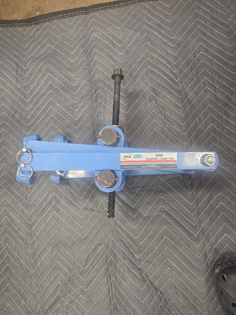 OTC Clamshell Strut Spring Compressors 6494. Strut and coil spring compressor.