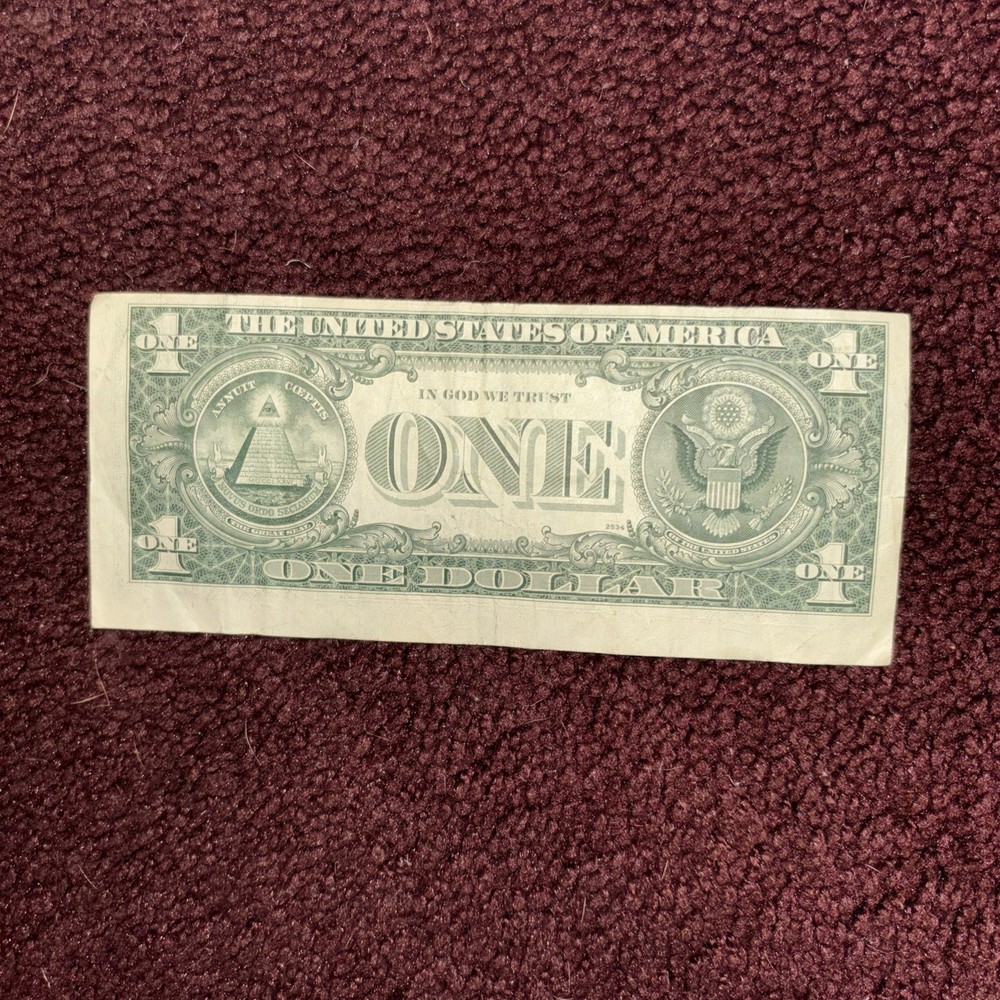 Run for the Borders!!! Miscut One-Dollar Bill Also Has Slight Serial # Overlap!!