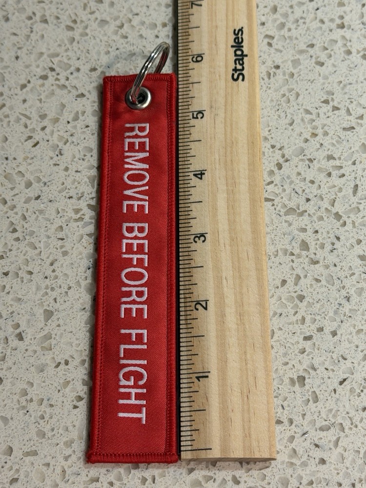 Pre-Owned Red SpaceX Falcon 9 Rocket Remove Before Flight Keychain Zipper Pull