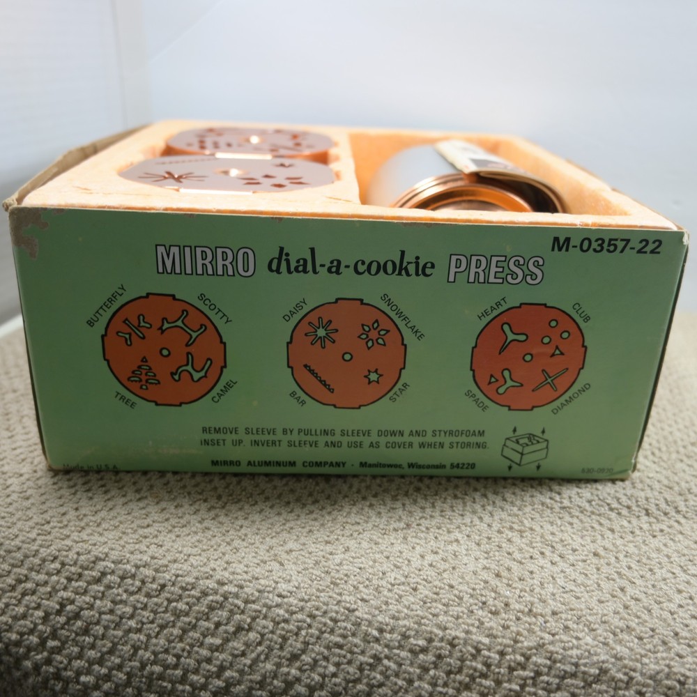 Mirro Dial a cookie cookie press copper colored top and inserts