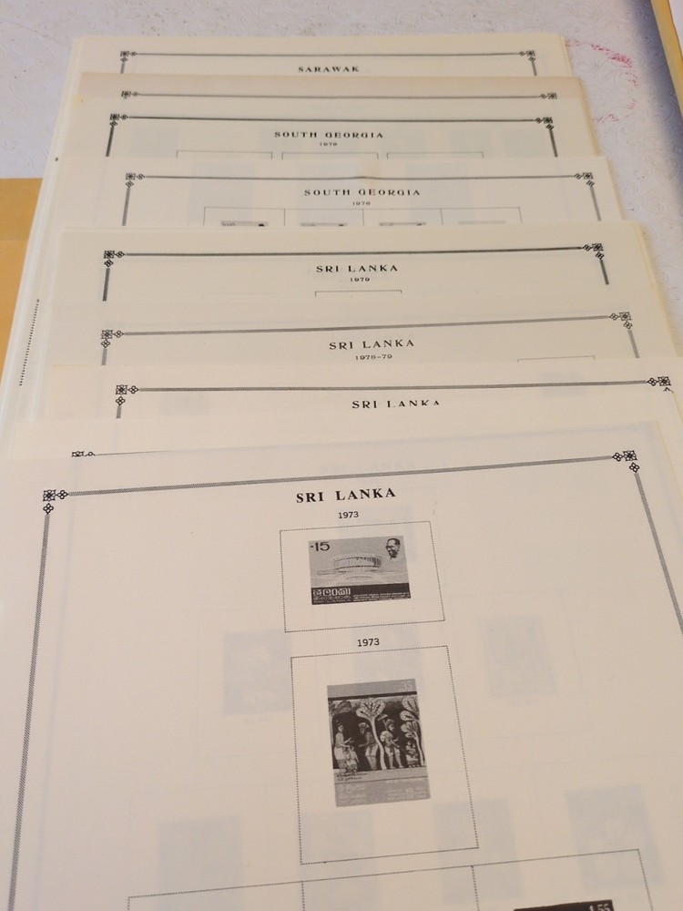 APC Z6427 Scott International pages with 11 stamps Sarawak S Georgia Sri Lanka