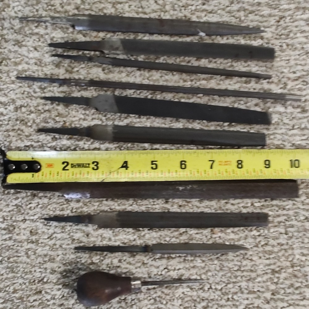 FILE SET WITH SCRAPER AND HANDLED PICK