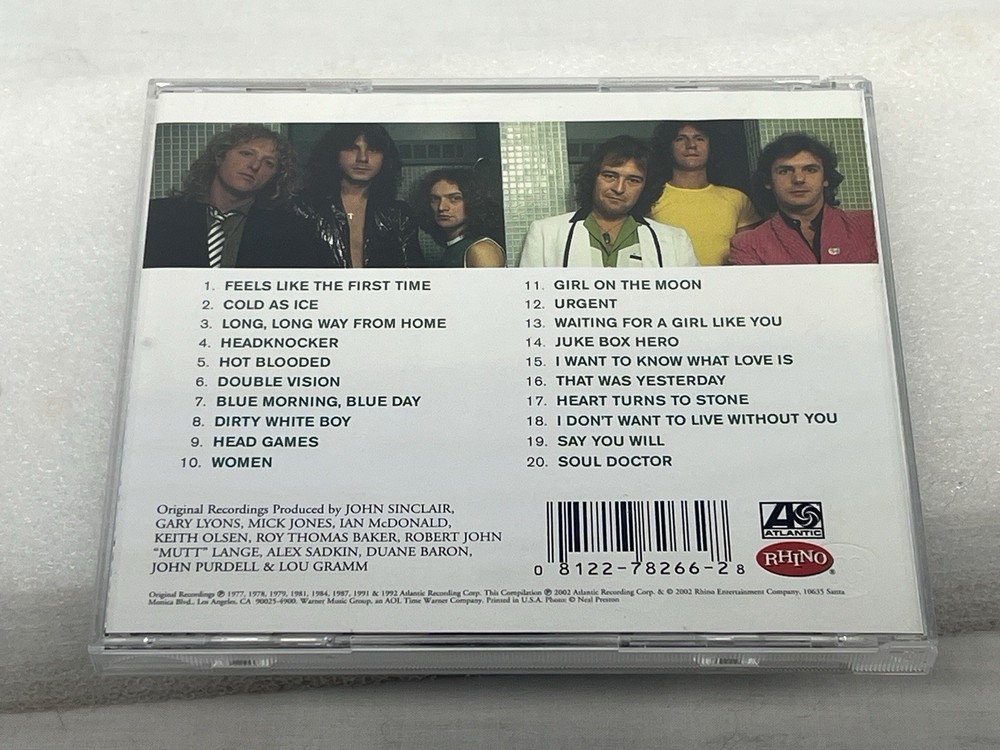 Mick Jones Signed Autograph Foreigner CD Complete Greatest Hits