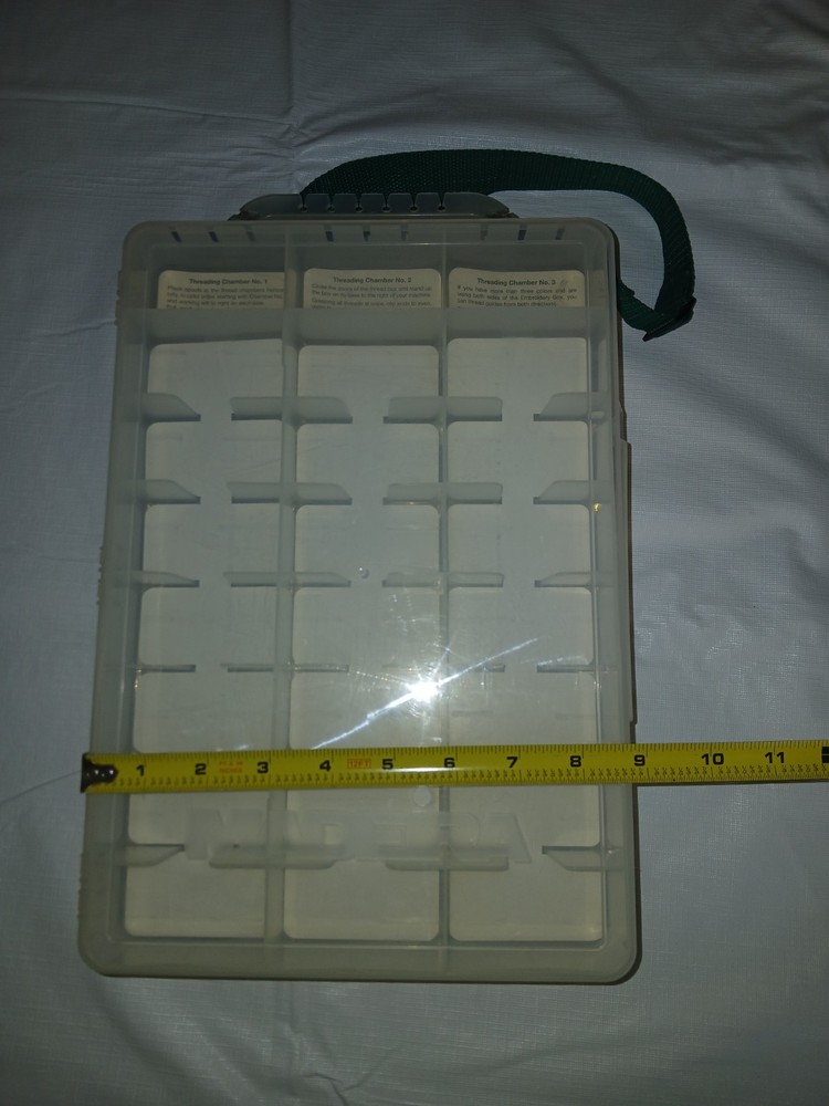 Machine embroidery thread case with cutters and thread holes