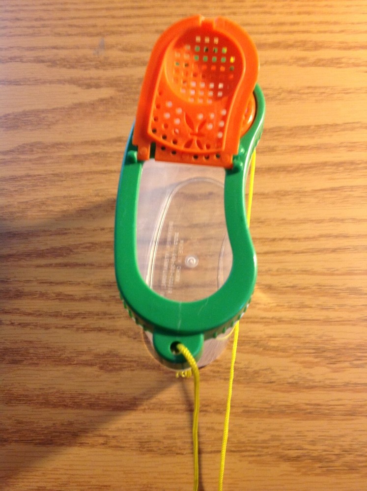 green orange and clear bug habitat