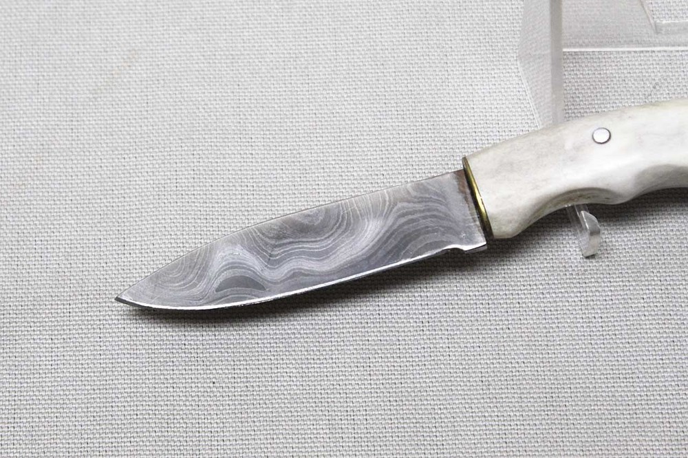 Knife marked Ratterree w/White Antler Handle . DW145