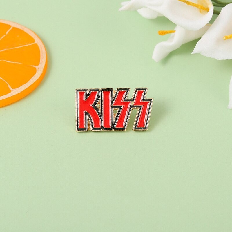 AMERICAN ROCK BAND "KISS" LAPEL PIN...