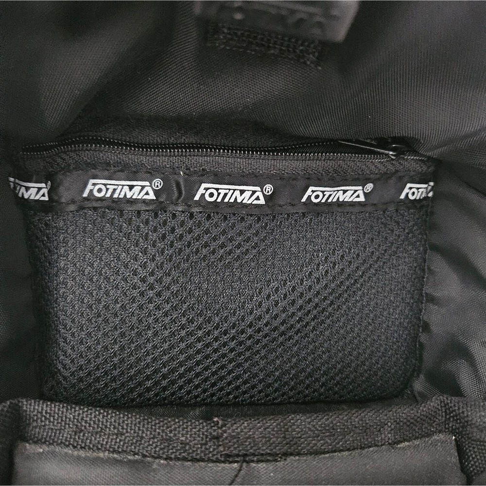 Fotima black camera carrying case model no. 60C with strap and pockets