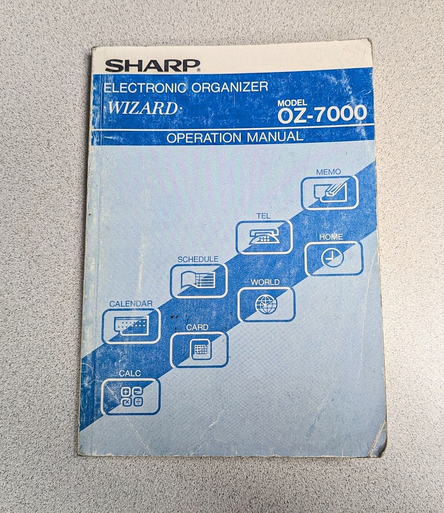 Sharp Wizard OZ-7000 Electronic Organizer with Time & Expense Manager Card