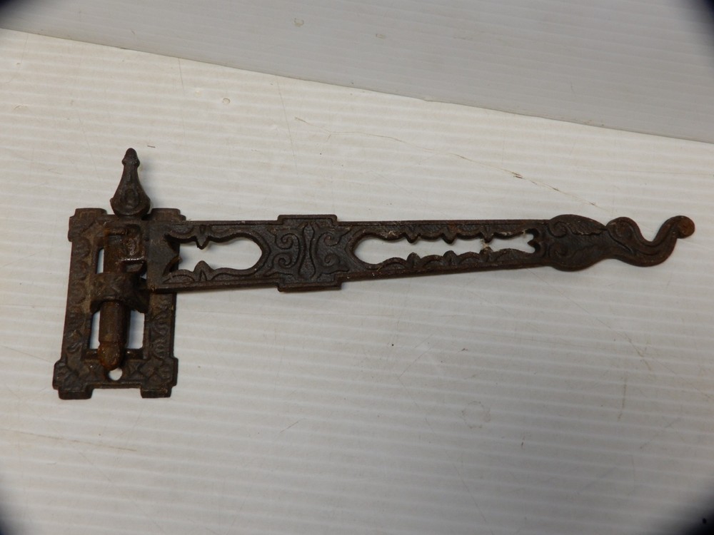 ANTIQUE CAST IRON SWINGING WALL HOOK CA 1870