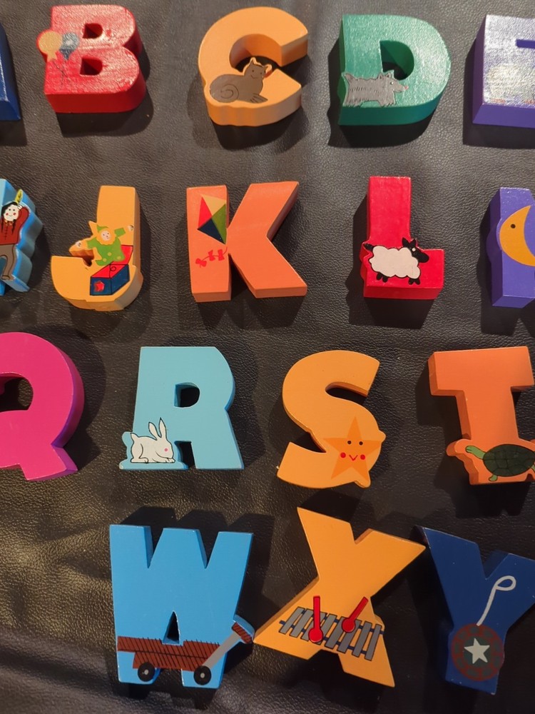 Solid wood alphabet letters in wood case