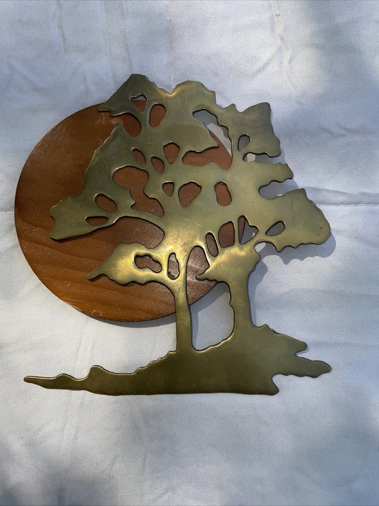brass tree with wooden moon