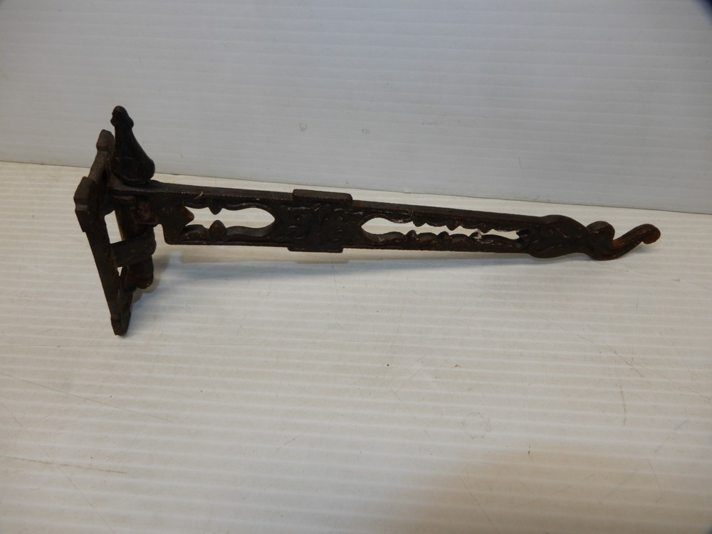 ANTIQUE CAST IRON SWINGING WALL HOOK CA 1870