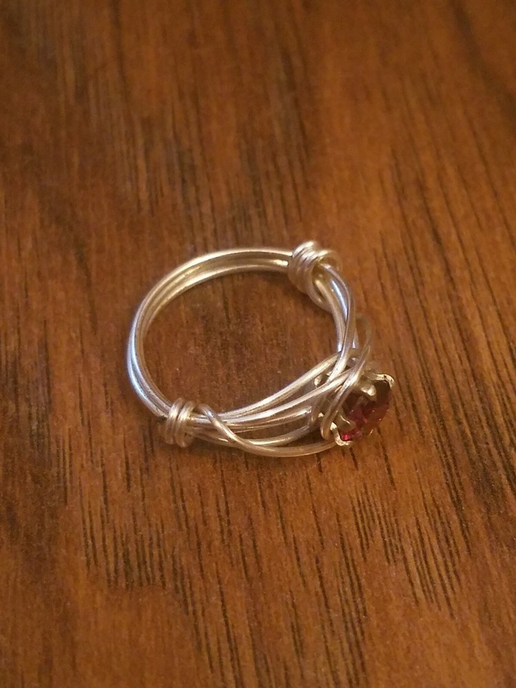 Wire wrapped ring with 6mm garnet CZ size 6.5 - 7